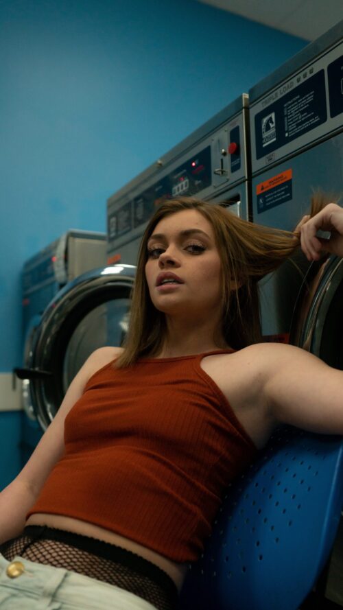 beautiful girl doing laundry